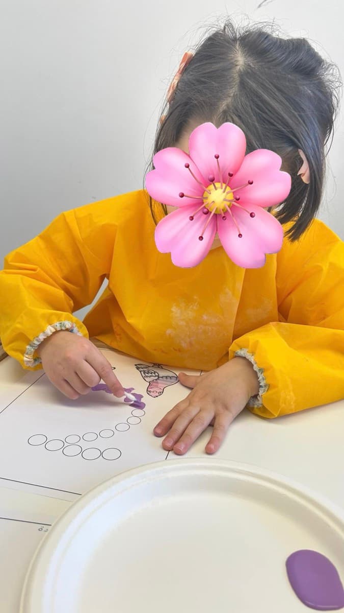 Child painting during art time